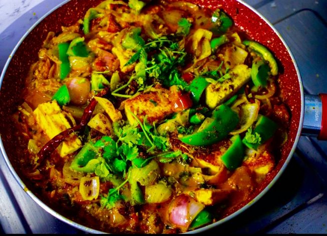 Dhaba Style Paneer Do Pyaza kept in a pan