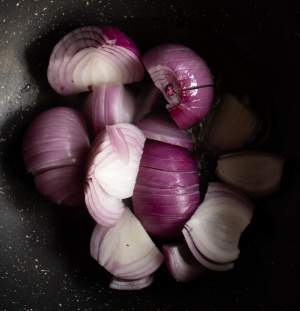 frying onions in a pan