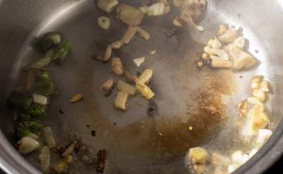 sauteing ginger and garlic with green chilies