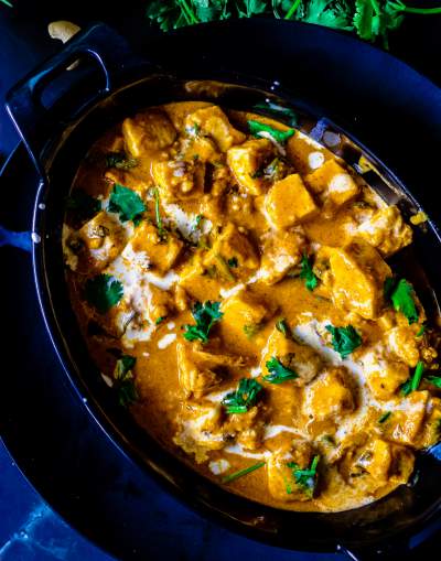 Paneer Makhani kept on a black dish